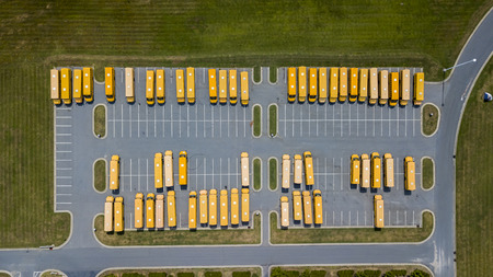 School buses prepare for another school year.の写真素材