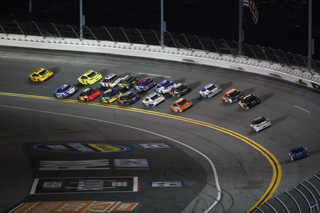 February 15, 2018 - Daytona Beach, Florida, USA: The Monster Energy NASCAR Cup Series teams race through the turns during the Can-Am Duels at Daytona International Speedway in Daytona Beach, Florida.のeditorial素材