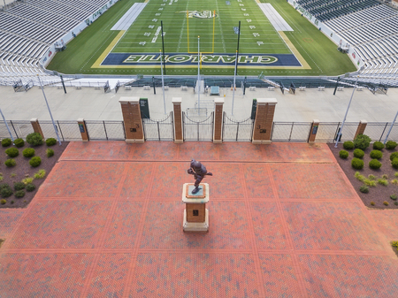 UNC Charlotte's Division I FCS football team kicked off in 2013. It plays at Jerry Richardson Stadium, which holds approximately 15,000 people and can be expanded to hold up to 40,000 people. Its first game was a 52-7 victory against Campbell University oのeditorial素材