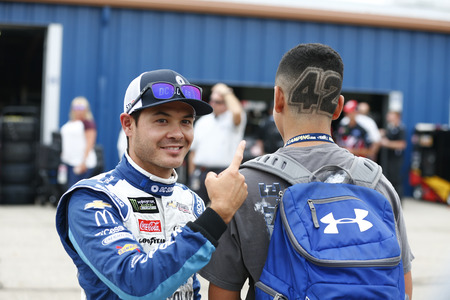 August 10, 2018 - Brooklyn, Michigan, USA: Kyle Larson (42) hangs out in the garage during practice for the Consumers Energy 400 at Michigan International Speedway in Brooklyn, Michigan.のeditorial素材