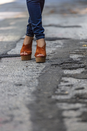 A beautiful model posing in an urban environment on a summers dayの写真素材