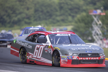 August 25, 2018 - Elkhart Lake, WI, USA: DAVE ROMBERG (60) races through the field at the 9th Annual Johnsonville 180 at Road America in Elkhart Lake, WI.のeditorial素材