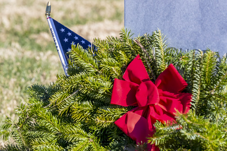 Veterans cemetery adorned with wreaths for the holiday seasonのeditorial素材