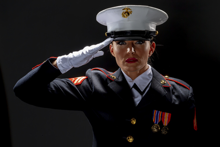 A female military Marine posing in a military uniformの写真素材