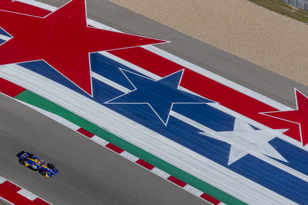ALEXANDER ROSSI (27) of the United States goes through the turns during practice for the IndyCar Spring Test at Circuit Of The Americas in Austin, Texas.のeditorial素材