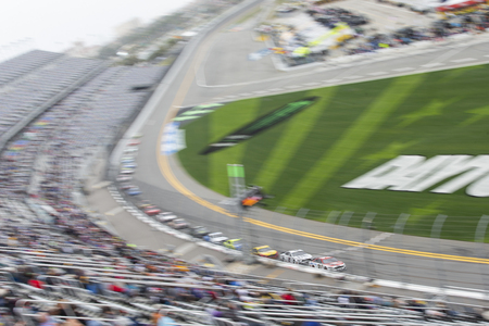 February 10, 2019 - Daytona Beach, Florida, USA: Paul Menard (21) races down the front stretch for the Advance Auto Parts Clash at Daytona International Speedway in Daytona Beach, Florida.のeditorial素材