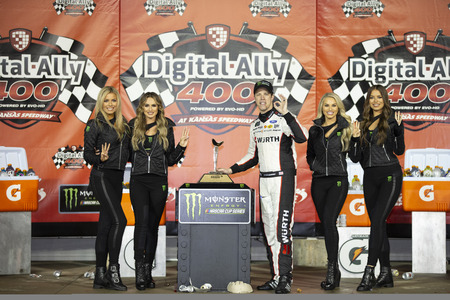 Brad Keselowski (2) wins the Digital Ally 400 at Kansas Speedway in Kansas City, Kansas.のeditorial素材