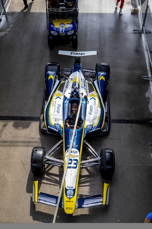 The car of CHARLIE KIMBALL (23) of the United States heads to pit road before the last practice for the Indianapolis 500 at Indianapolis Motor Speedway in Indianapolis, Indiana.のeditorial素材