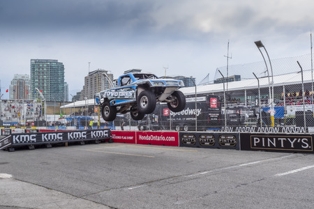 The Super Stadium Truck Challenge teams take to the track to race for the Hondy Indy Toronto at Streets of Toronto in Toronto Ontario.のeditorial素材