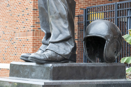 July 21, 2019 - Iowa City, Iowa, USA: Statue of Nile Clarke Kinnick Jr. who was a student and a college football player at the University of Iowa. He won the 1939 Heisman Trophy and died during while serving as a Naval Aviator in World War II.のeditorial素材