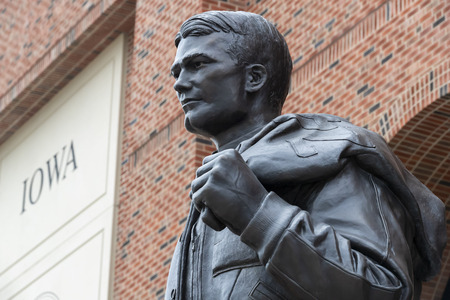 July 21, 2019 - Iowa City, Iowa, USA: Statue of Nile Clarke Kinnick Jr. who was a student and a college football player at the University of Iowa. He won the 1939 Heisman Trophy and died during while serving as a Naval Aviator in World War II.のeditorial素材