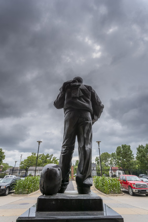 July 21, 2019 - Iowa City, Iowa, USA: Statue of Nile Clarke Kinnick Jr. who was a student and a college football player at the University of Iowa. He won the 1939 Heisman Trophy and died during while serving as a Naval Aviator in World War II.のeditorial素材