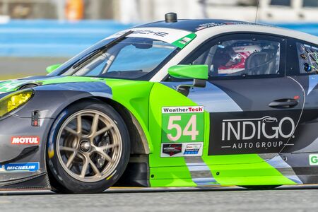 January 24, 2020 - Daytona Beach, Florida, USA: The Black Swan Racing Porsche 911 GT3 R car  practices for the Rolex 24 At Daytona at Daytona International Speedway in Daytona Beach, Florida.のeditorial素材