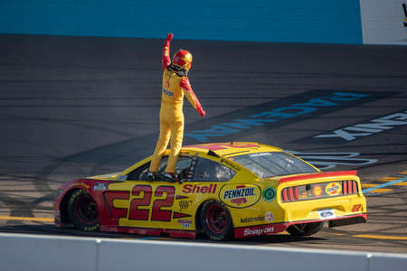 Joey Logano (22) wins the FanShield 500 at Phoenix Raceway in Avondale, Arizona.のeditorial素材
