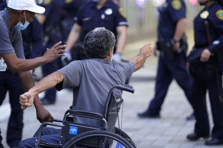 May 29, 2020 - Houston, Texas, USA: Police and spectators collide in downtown Houston, TX as rioters protest the beating and killing of George Floyd by Minneapolis police earlier in the week.のeditorial素材