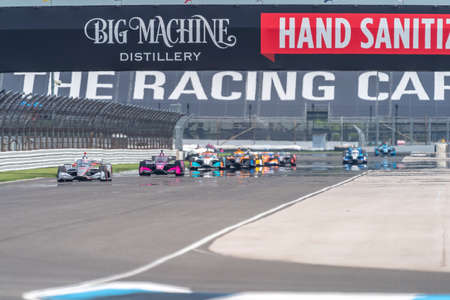 WILL POWER (12) of Toowoomba, Australia  races through the turns during the  race for the GMR Grand Prix at Indianapolis Motor Speedway in Indianapolis, Indiana.のeditorial素材