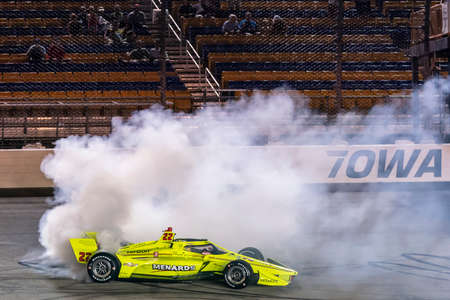 Coming from the back of the field, SIMON PAGENAUD (22) of Montmorillon, France  wins the Iowa INDYCAR 250s at the Iowa INDYCAR 250s at Iowa Speedway in Newton, Iowa.のeditorial素材