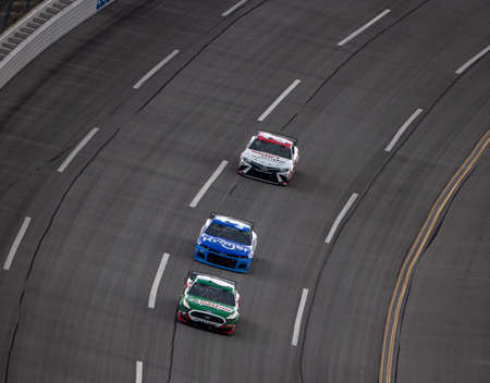 Ryan Newman (6) races for position for the GEICO 500 at Talladega Superspeedway in Lincoln, Alabama.のeditorial素材