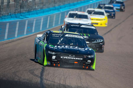 Ross Chastain (10) races for position for the LS Tractor 200 at Phoenix Raceway in Avondale, Arizona.のeditorial素材