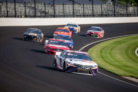 Denny Hamlin (11) races for position for the Big Machine Hand Sanitizer 400 Powered by Big Machine Records at Indianapolis Motor Speedway in Indianapolis, .のeditorial素材