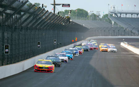 Joey Logano (22) races for position for the Big Machine Hand Sanitizer 400 Powered by Big Machine Records at Indianapolis Motor Speedway in Indianapolis, .のeditorial素材