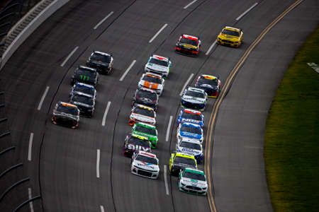 Joey Logano (22) and Alex Bowman (88) races for position for the GEICO 500 at Talladega Superspeedway in Lincoln, Alabama.のeditorial素材