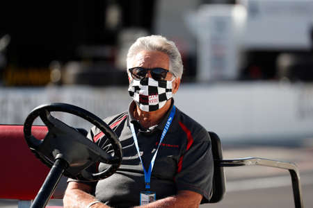 Legend, Mario Andretti, talks to drivers before Carb Day for the Indianapolis 500 in Indianapolis, Indiana.のeditorial素材