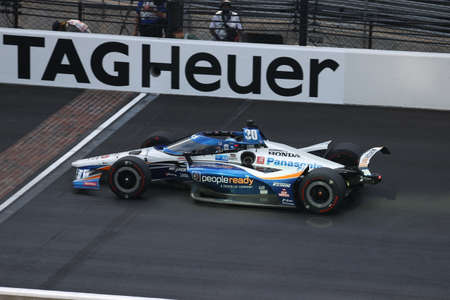 \{persons}\wins the Indianapolis 500 at the Indianapolis Motor Speedway in Indianapolis, Indiana.のeditorial素材