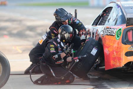 Corey LaJoie (32) races for the FireKeepers Casino 400 at Michigan International Speedway in...