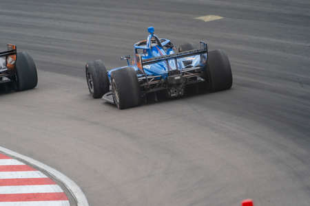 SCOTT DIXON (9) of Auckland, New Zealand races through the turns during the  race for the Bommarito...