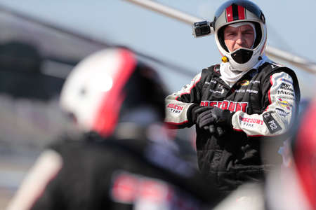 Brad Keselowski (2) races for the FireKeepers Casino 400 at Michigan International Speedway in...