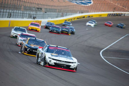 Ross Chastain (10) races for position for the Alsco 300 at Las Vegas Motor Speedway in Las Vegas, Nevada.のeditorial素材