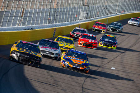Chris Buescher (17) battles for position for the South Point Hotel & Casino 400 at Las Vegas Motor Speedway in Las Vegas, Nevada.のeditorial素材