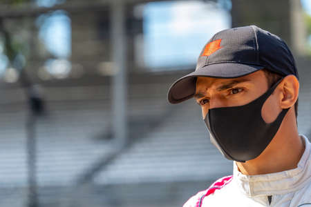 ALEX PALOU (R) (55) of Barcelona, Spain  prepares to practice for the Harvest GP at the Indianapolis Motor Speedway in Indianapolis, Indiana.のeditorial素材