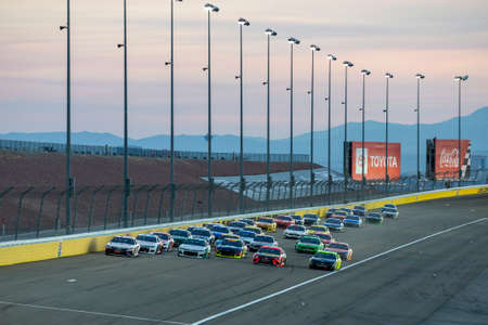 Denny Hamlin (11) battles for position for the South Point Hotel & Casino 400 at Las Vegas Motor...