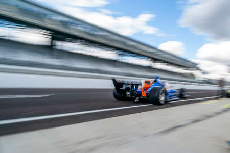 SCOTT DIXON (9) of Auckland, New Zealand practices for the Harvest GP at the Indianapolis Motor Speedway in Indianapolis, Indiana.のeditorial素材