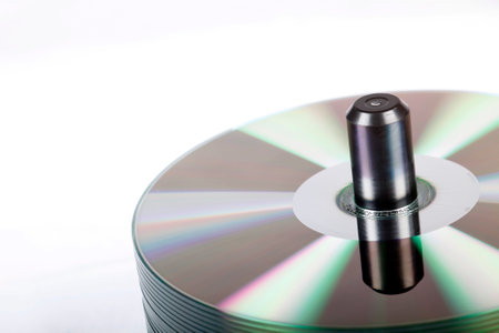 Isolated view of a stack of DVDâ€™s in a studio environment