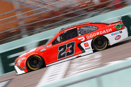 Bubba Wallace (23) races for the Dixie Vodka 400 at HomesteadâMiami Speedway in Homestead, Florida.のeditorial素材