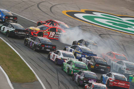 Martin Truex Jr. (19) wrecks during the O'Reilly Auto Parts 253 At Daytona at Daytona Road Course in...