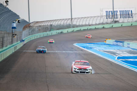 Ryan Blaney (12) battles for position to start the Dixie Vodka 400 at Homestead Miami Speedway in Miami , Florida.のeditorial素材