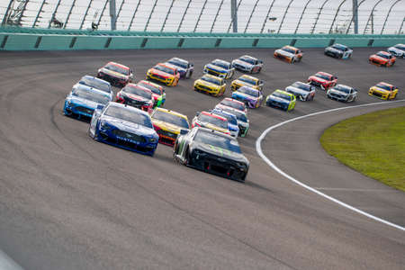 Kurt Busch (1) races for position for the Dixie Vodka 400 at Homestead Miami Speedway in Miami , Florida.のeditorial素材