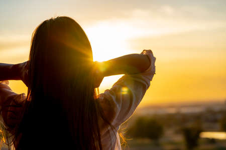 A beautiful hispanic model enjoys the Arizona desert on a winters dayの写真素材