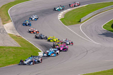 CONOR DALY (20) Of the United States races through the turns during the  race for the Honda INDY...