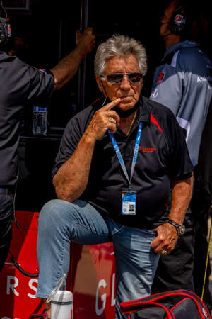 IndyCar Team Owner, Mario Andretti watches as his teams prepare to race for the 105th Running Of The Indianapolis 500 at Indianapolis Motor Speedway in Indianapolis, Indiana.のeditorial素材