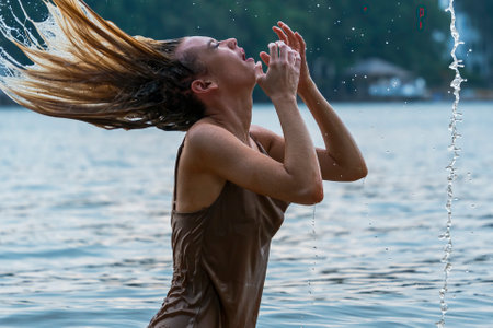 A gorgeous blonde model enjoys a day at the lake