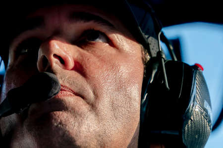 IndyCar Team Manager, Larry Foyt Jr watches as his teams prepare to qualify for the Big Machine Spiked Coolers Grand Prix at Indianapolis Motor Speedway in Indianapolis, Indiana.のeditorial素材