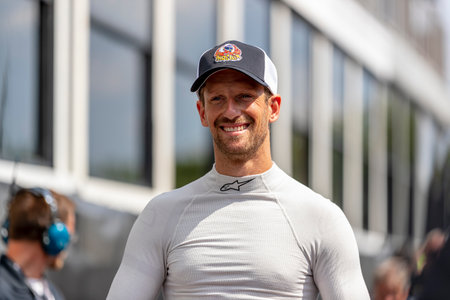 ROMAIN GROSJEAN (R) (51) of Geneva, Switzerland prepares to qualify for the Big Machine Music City Grand Prix at the The Streets of Nashville in Nashville, Tennessee.のeditorial素材
