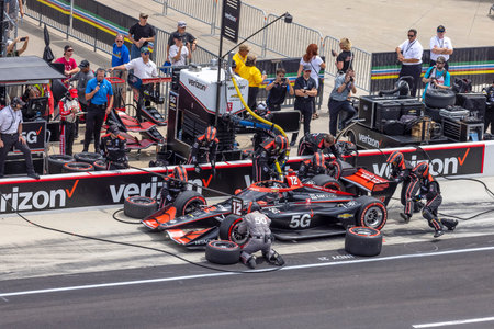 WILL POWER (12) of Toowoomba, Australia brings his car in for service during the Big Machine Spiked Coolers Grand Prix at Indianapolis Motor Speedway in Indianapolis Indiana.のeditorial素材