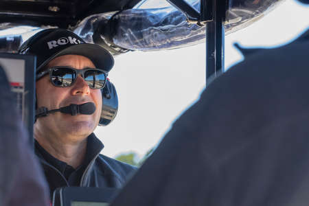 IndyCar Team Manager, Larry Foyt Jr watches as his teams prepare to race for the Firestone Grand Prix of Monterey at WeatherTech Raceway Laguna Seca in Monterey, California.のeditorial素材