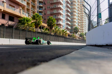 CALLUM LLOTT (R) (75) of Cambridge, England practices for the Acura Grand Prix of Long Beach at Streets of Long Beach in Long Beach, California.のeditorial素材